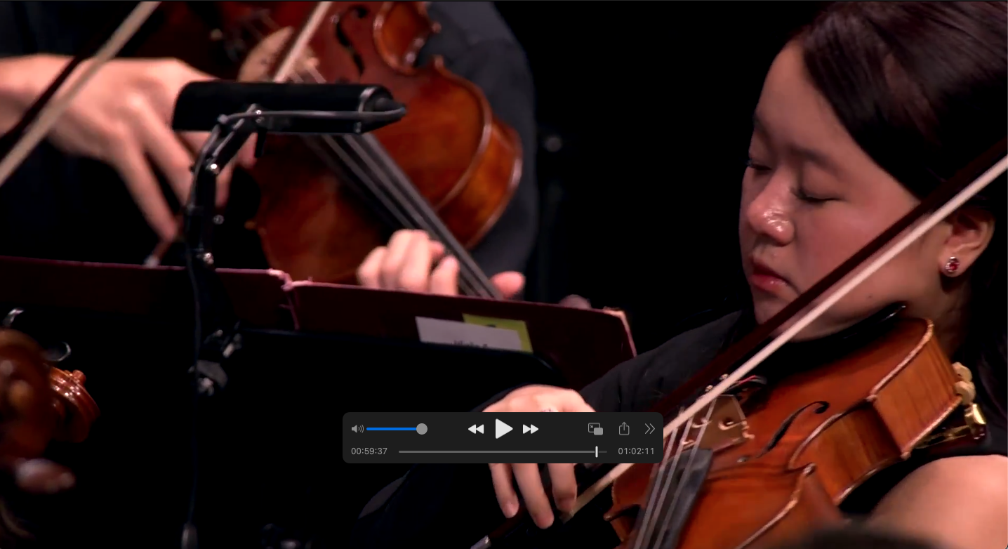 Ruby Ngọc Minh performing viola with the World Youth Orchestra